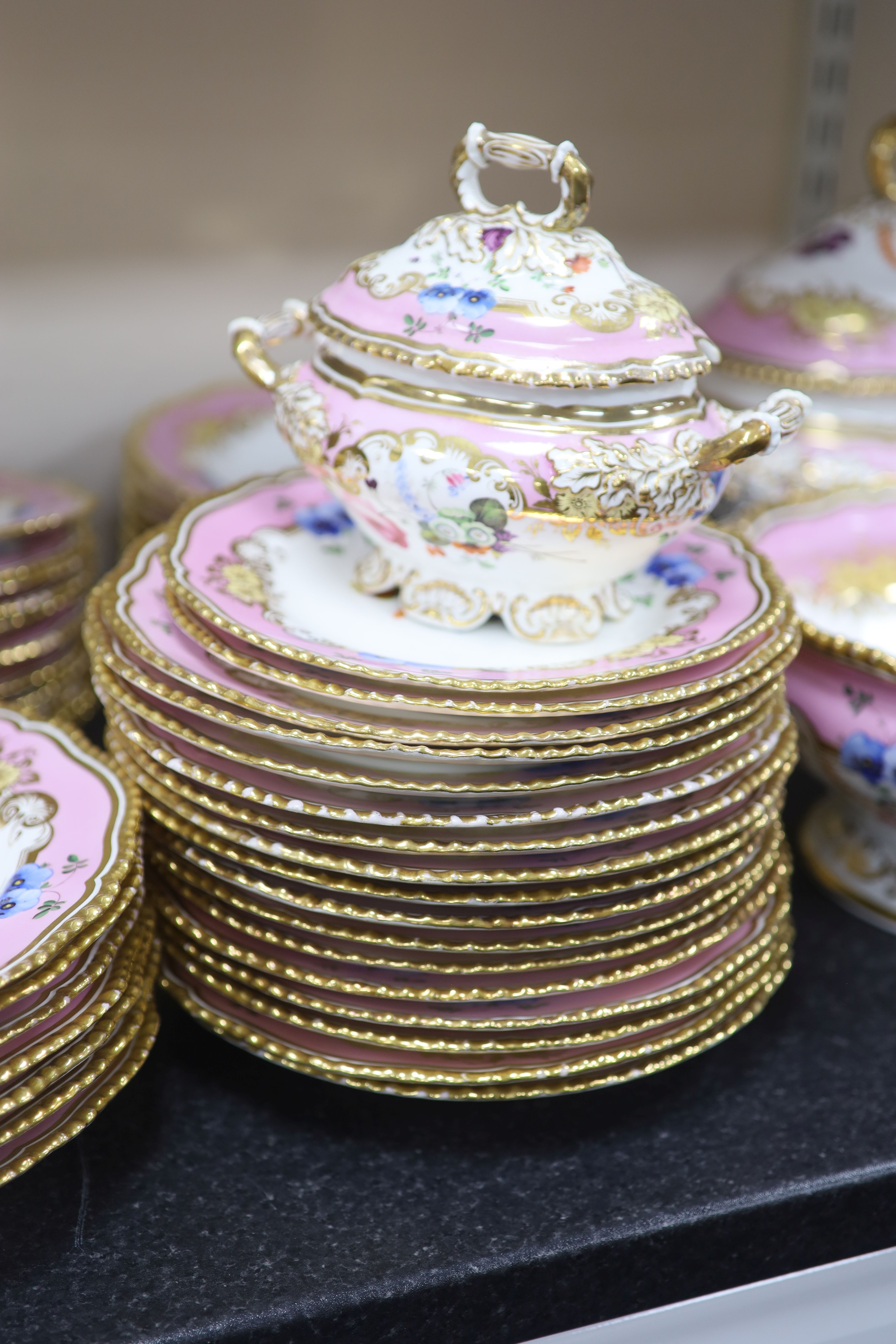 An extensive one hundred and thirteen piece English porcelain dinner and dessert service, c.1825-30,